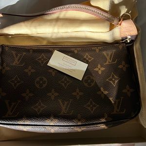 Louis Vuitton authentic pochette bag new without tag